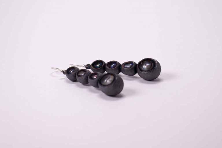 Ambroise Degenève, earrings : oxidized copper, gold, pearl Fossilized pearls
